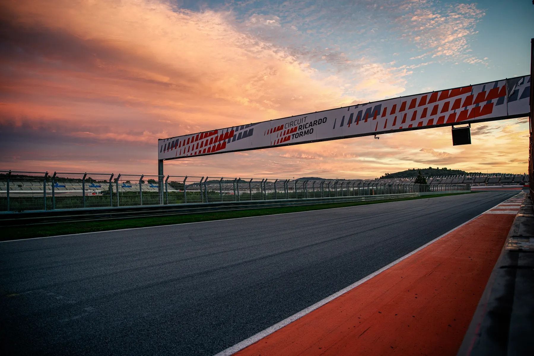 Sunrise over the start line of a circuit