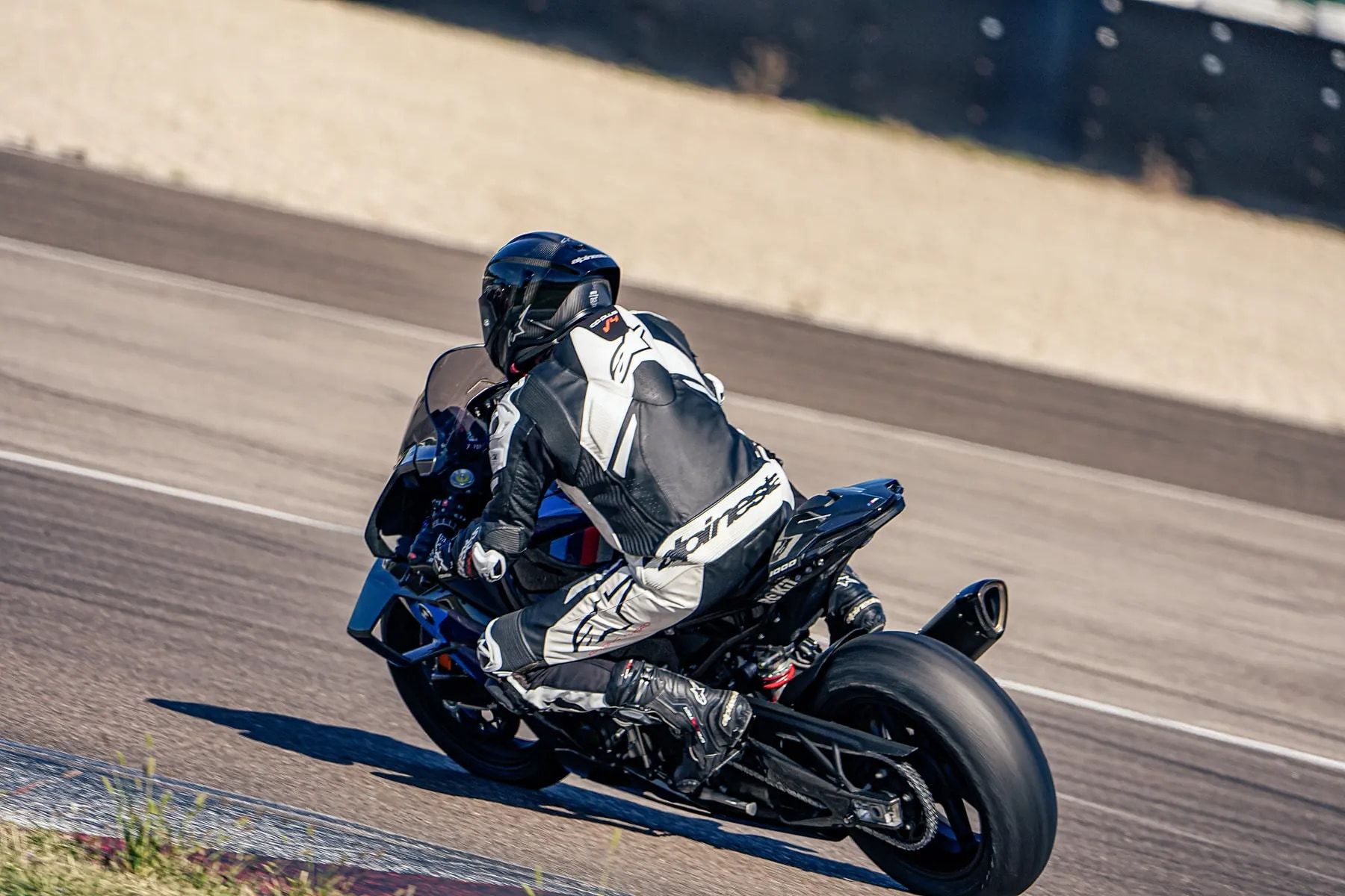 Motorcycle rider leaning into a corner